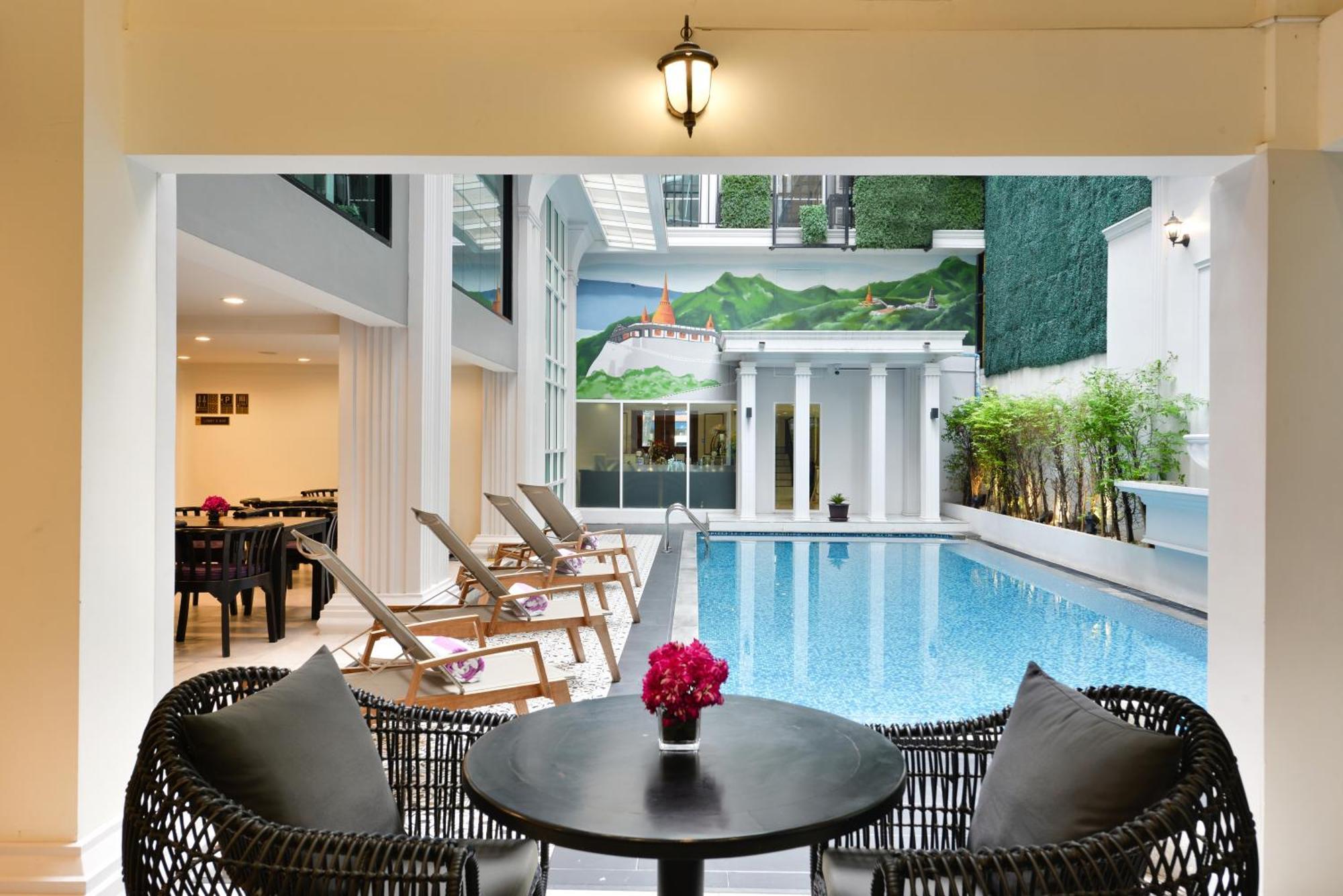 빌라 드 프라나콘 - 를레 앤 샤토 방콕 외부 사진 The pool at the hotel