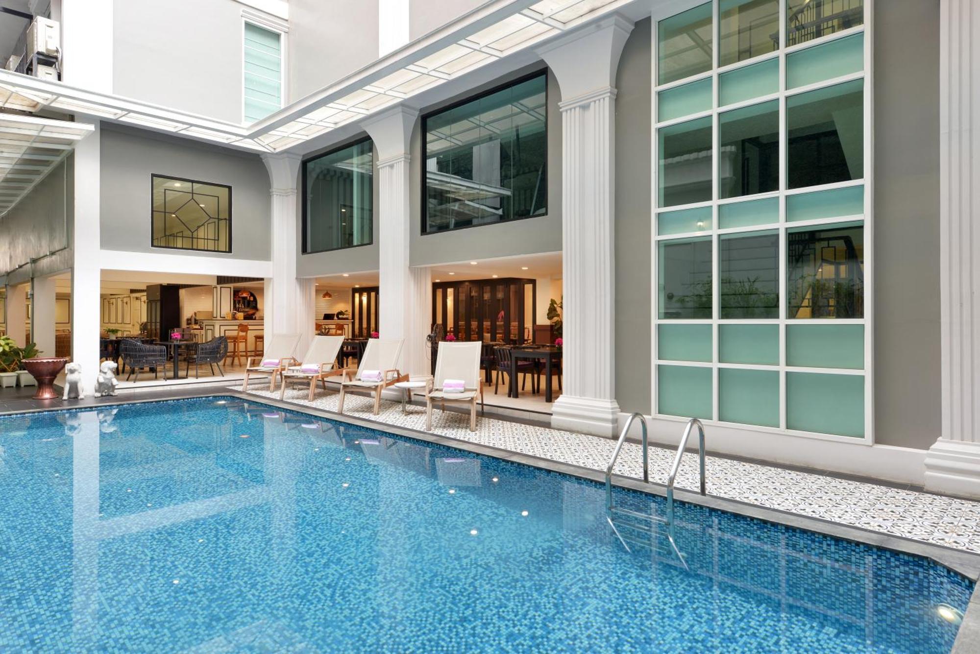 빌라 드 프라나콘 - 를레 앤 샤토 방콕 외부 사진 The swimming pool at the hotel